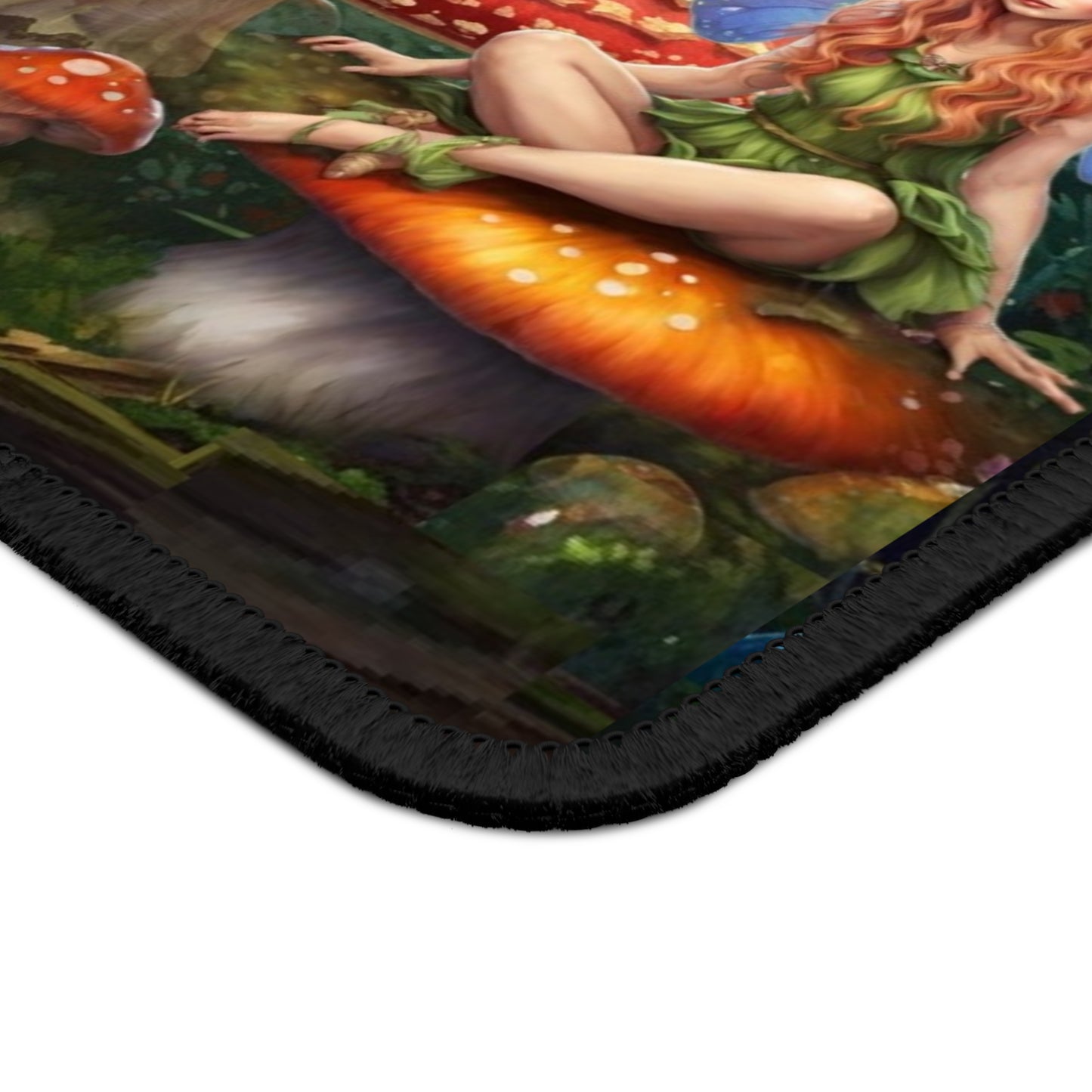 Mouse pad with fantasy design featuring a fairy on a mushroom