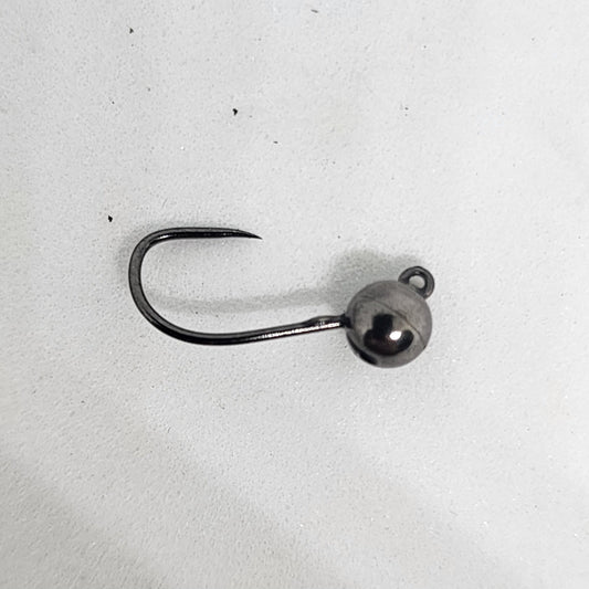 Metallic fishing hook with a ball on a white background