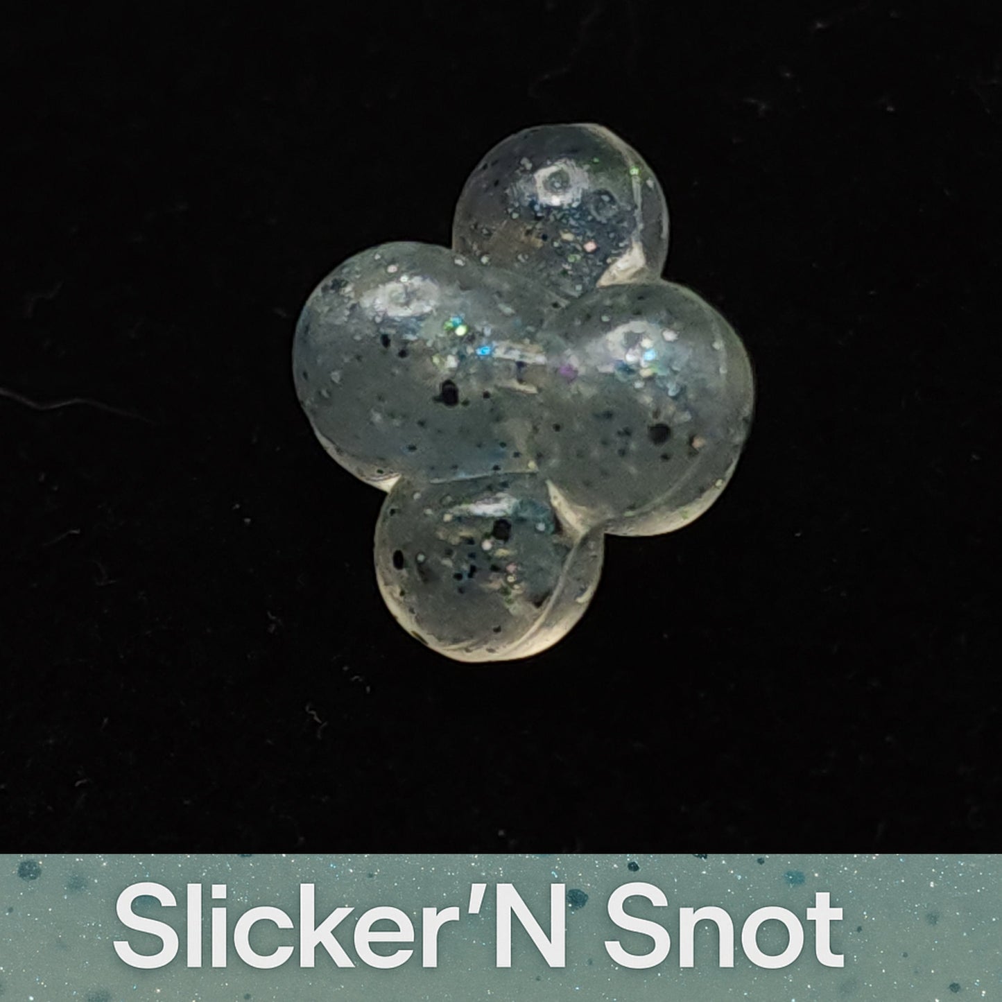 Clear gel-like Salmon Egg Cluster Fishing Lure, labeled 'Slicker'N Snot'.