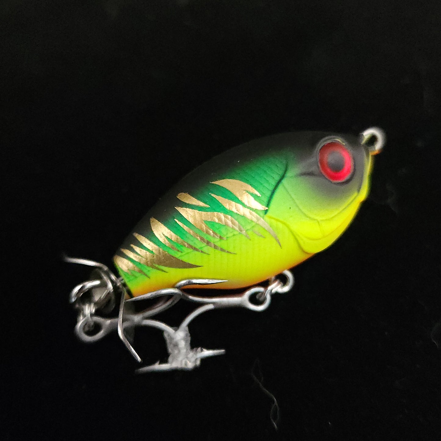 Colorful fishing lure with a black background