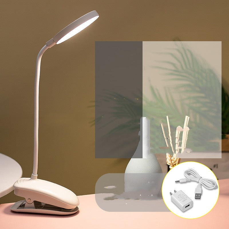 White LED desk lamp with flexible neck on a pink surface, with inset images of leaves and charging cable.