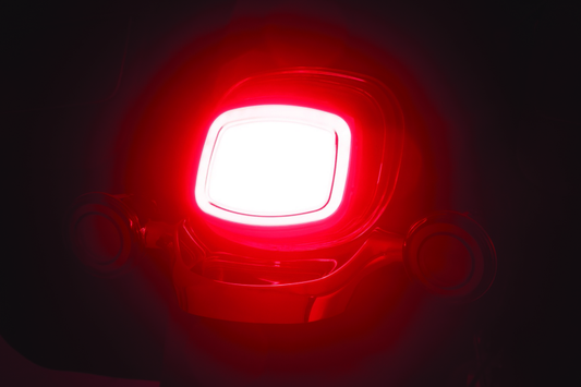 Red light emitting device on a dark background