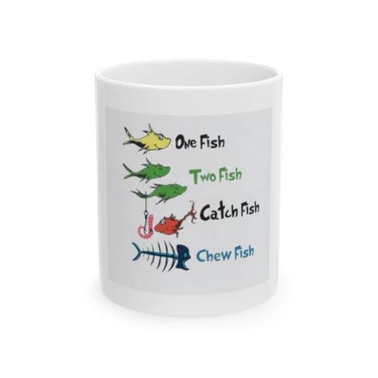 A white ceramic mug with colorful text and fish illustrations, spoofing the 'One Fish Two Fish' theme from Dr. Seuss.