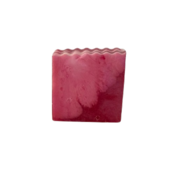 Blush & Bloom Rose Swirl Handmade Soap bar with a textured surface on a white background