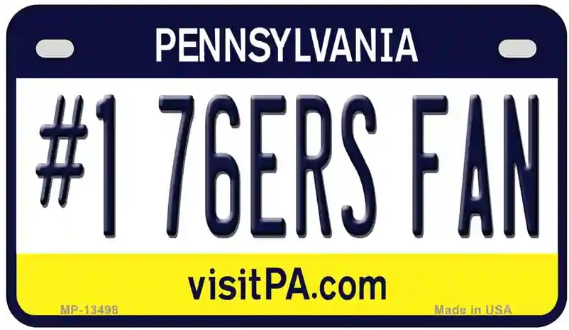 Pennsylvania Motorcycle license plate with '#1 76ERS FAN' text and visitPA.com website.