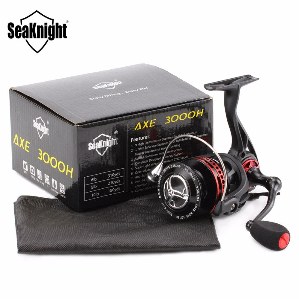Fishing reel with Seaknight packaging on a white background