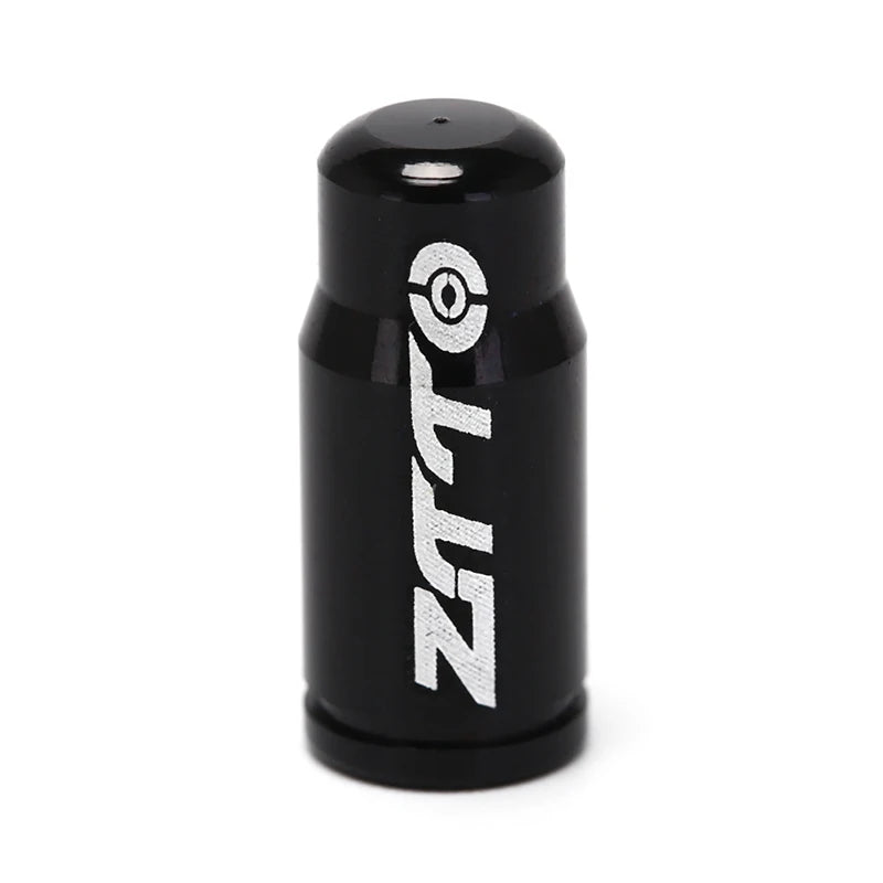 Black cylindrical valve cover with 'Zeta' branding on a white background