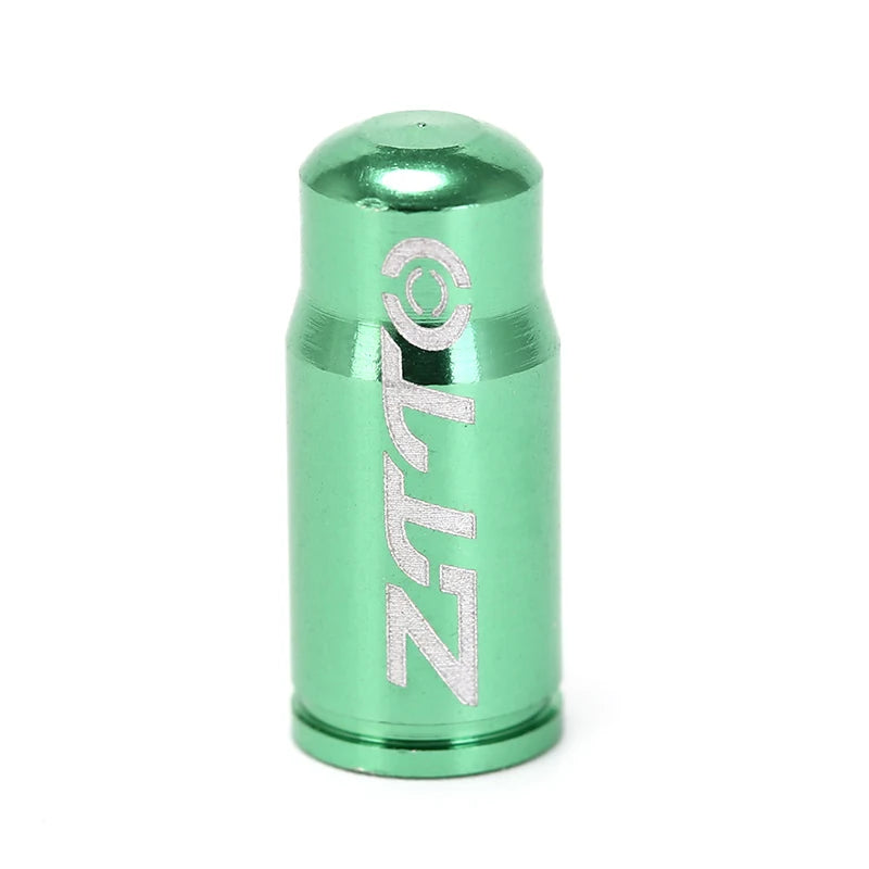 Green cylindrical valve cover with 'Zeta' branding on a white background