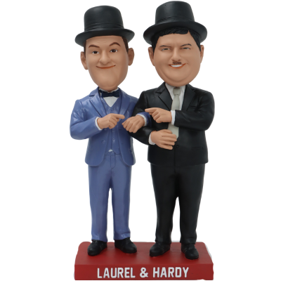 Bobbleheads of Laurel and Hardy in blue and black suits on a white background