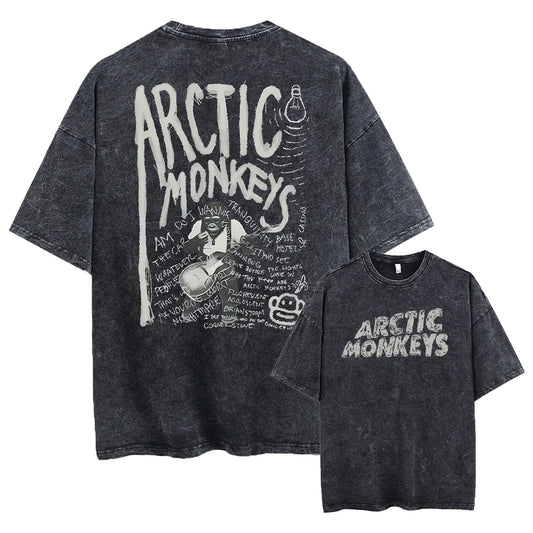 Black t-shirt with Arctic Monkeys branding on a white background