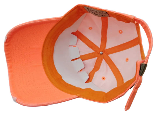 Orange cap with a white interior on a white background