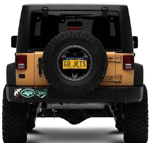 Jeep with a spare tire and 'GO JETS' license plate on a white background