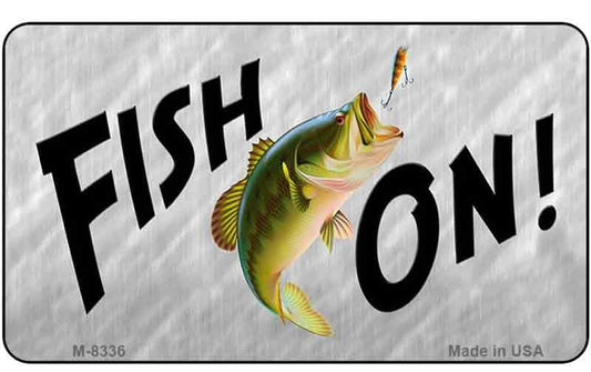 Metallic Magnet with a fish and 'Fish On!' text on a textured background