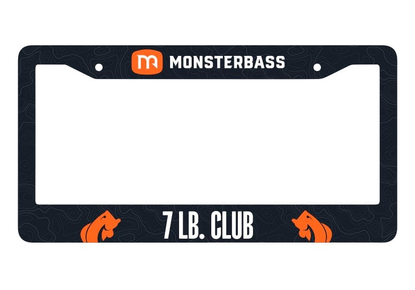 Black license plate frame with Monsterbass branding and '7 Lb. Club' text on a white background
