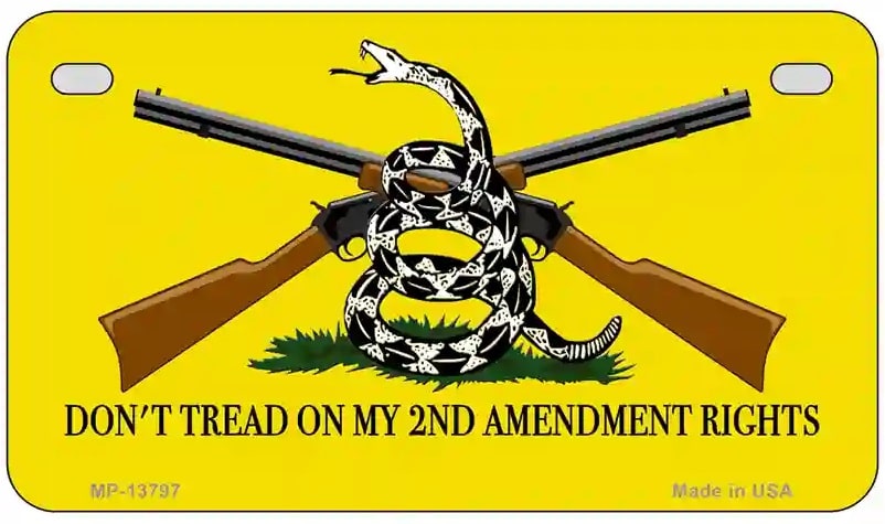 License plate with crossed rifles and a snake, featuring text 'Don't Tread on My 2nd Amendment Rights' on a yellow background.