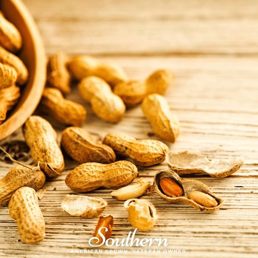 Peanuts in shells on a wooden surface with 'Southern' branding.