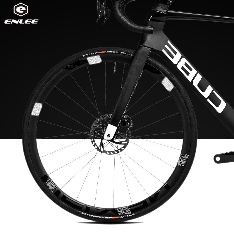 Close-up of a bicycle wheel with 'ENLEE' branding on a black and white background.