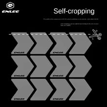 ENLEE self-cropping guide with gray shapes on a black background