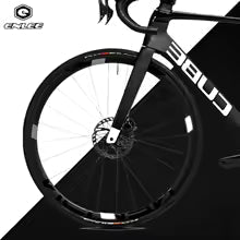 Close-up of a bicycle wheel with '804' branding on a black background