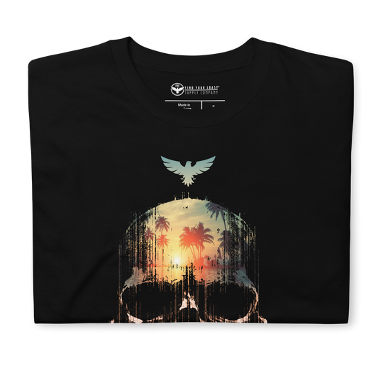 Black t-shirt with a graphic design of a skull with palm trees and a sunset, featuring a brand logo on the collar.