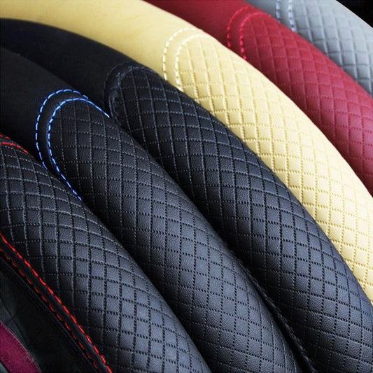Collection of steering Wheel covers in various colors.