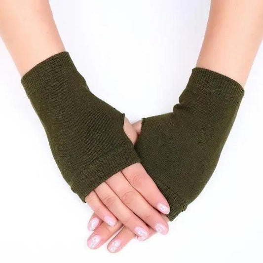 Green fingerless gloves worn on a white background