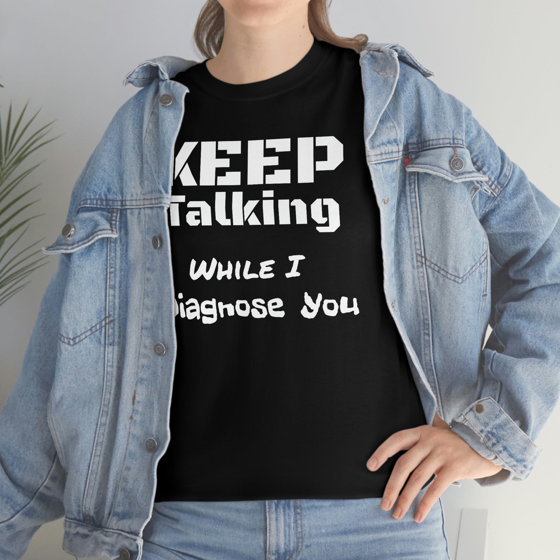 Keep Talking Unisex Heavy Cotton Tee In Black Female Model With  Jacket