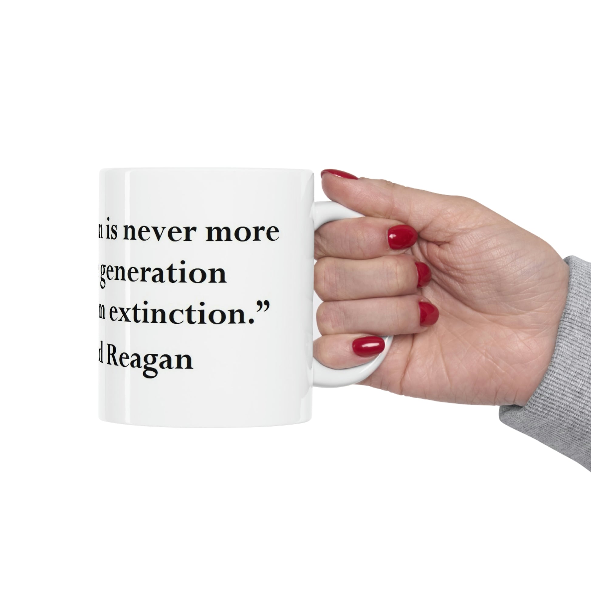 Hand Holds Ronald Reagan Ceramic Mug  With Freedom Quote