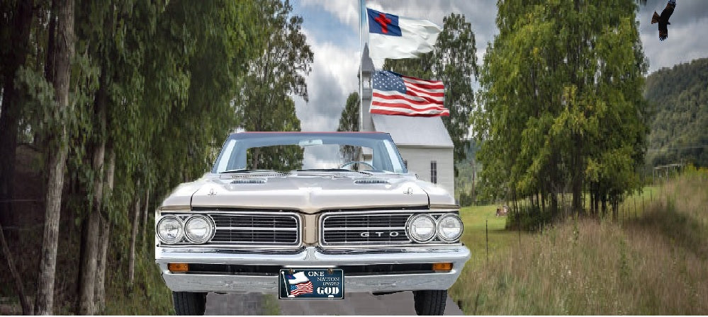 One Nation Under God License Plate Mounted On A Vehicle