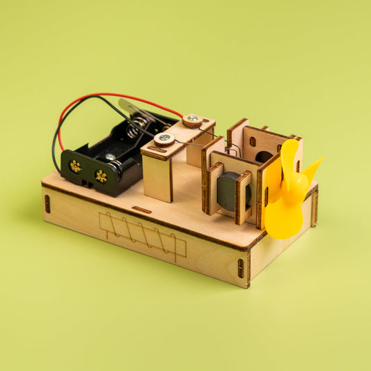 Mechanical device with a yellow component on a green background