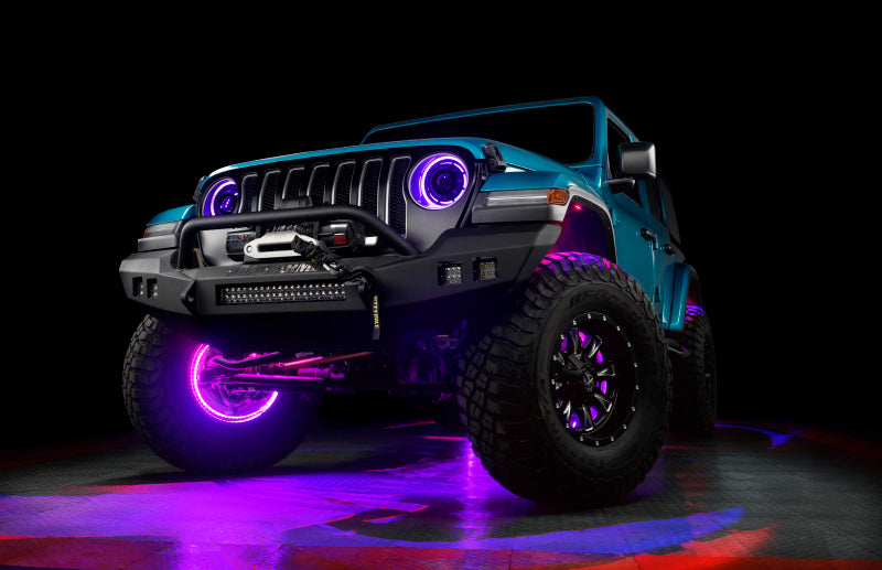 Blue Jeep Wrangler with purple accents on a dark background