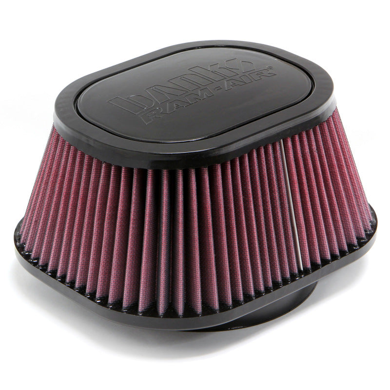 Red air filter with black top on a white background