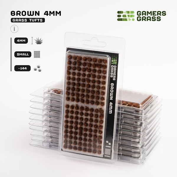 Packaged brown grass tufts with Gamers Grass branding on a white background