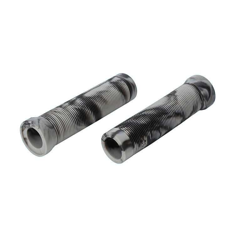 Two handlebar grips on a white background