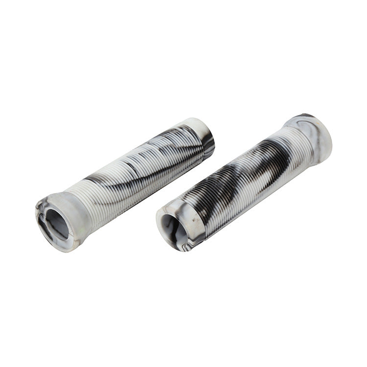 Two metal sleeves with textured surfaces on a white background