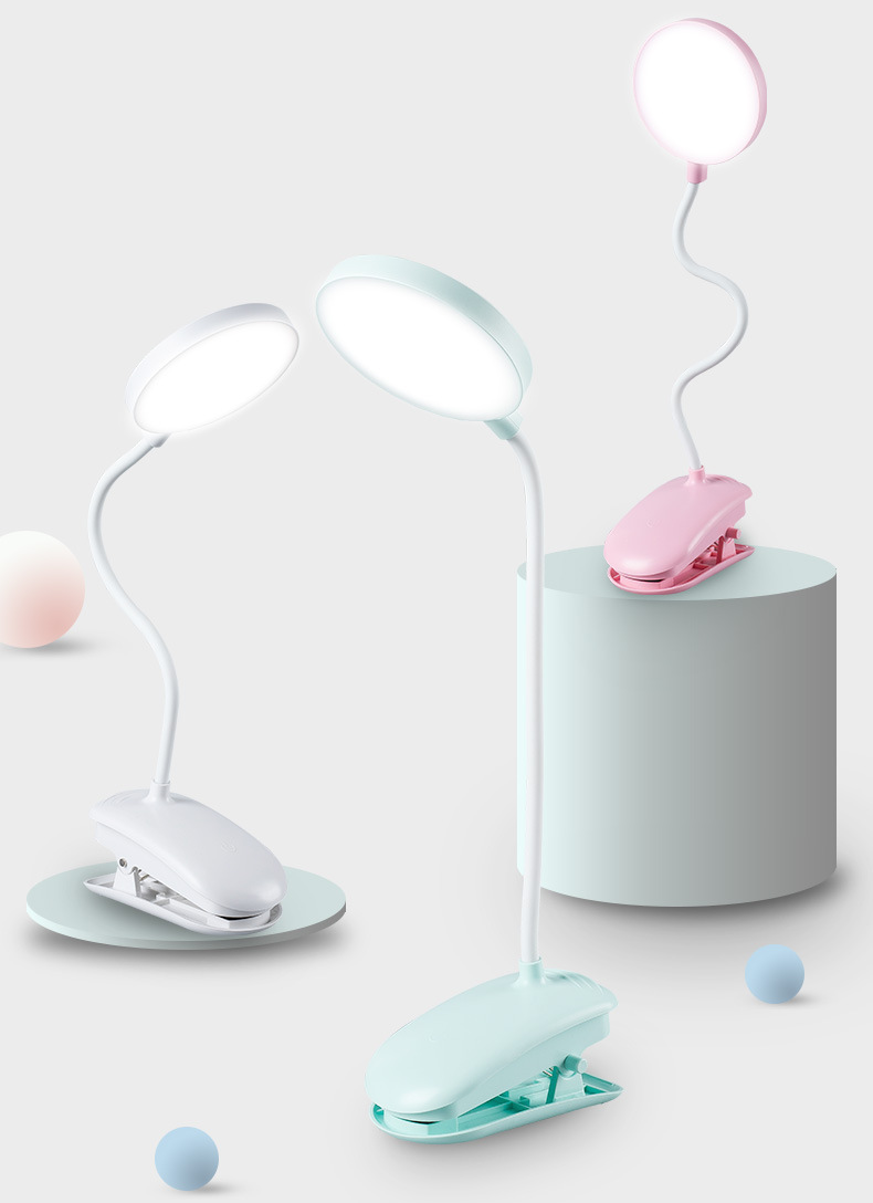Desk lamp with clip attachment on a white background