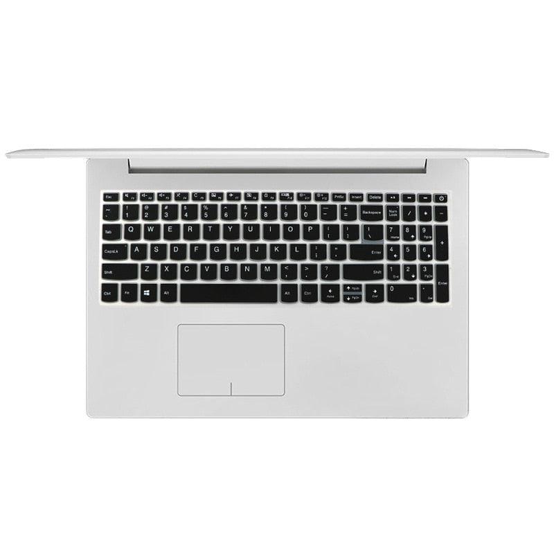 Silver laptop with black keyboard on a white background