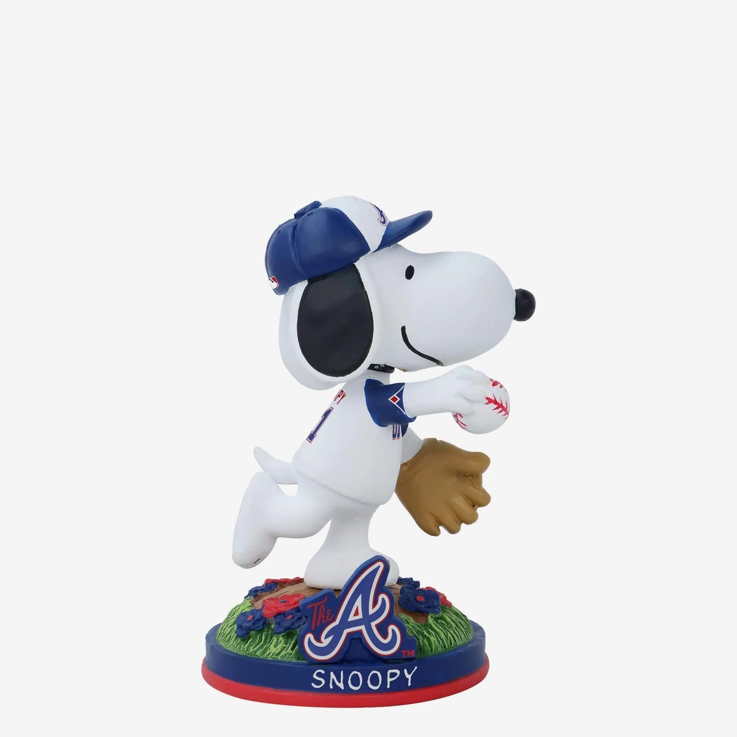 Snoopy figurine in a baseball uniform with a cap and glove on a white background