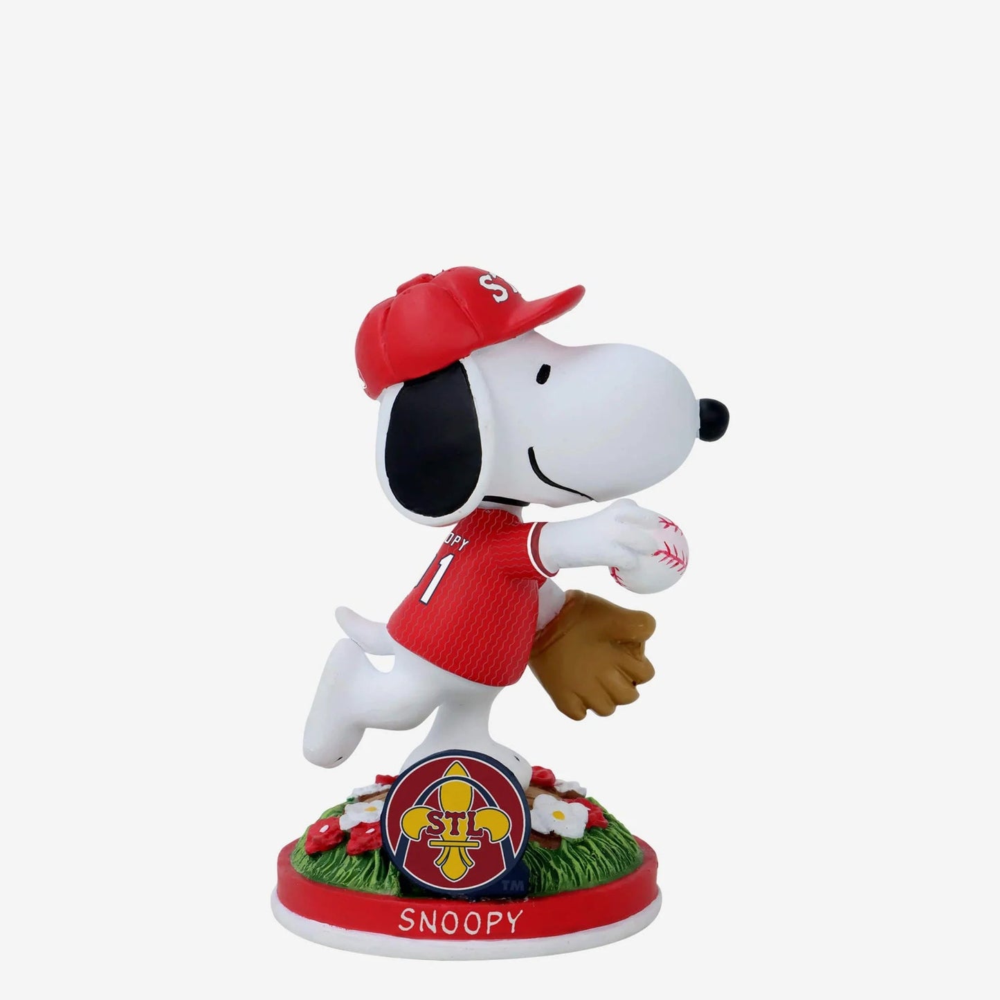 Snoopy figurine in a red baseball uniform with a cap and glove on a white background