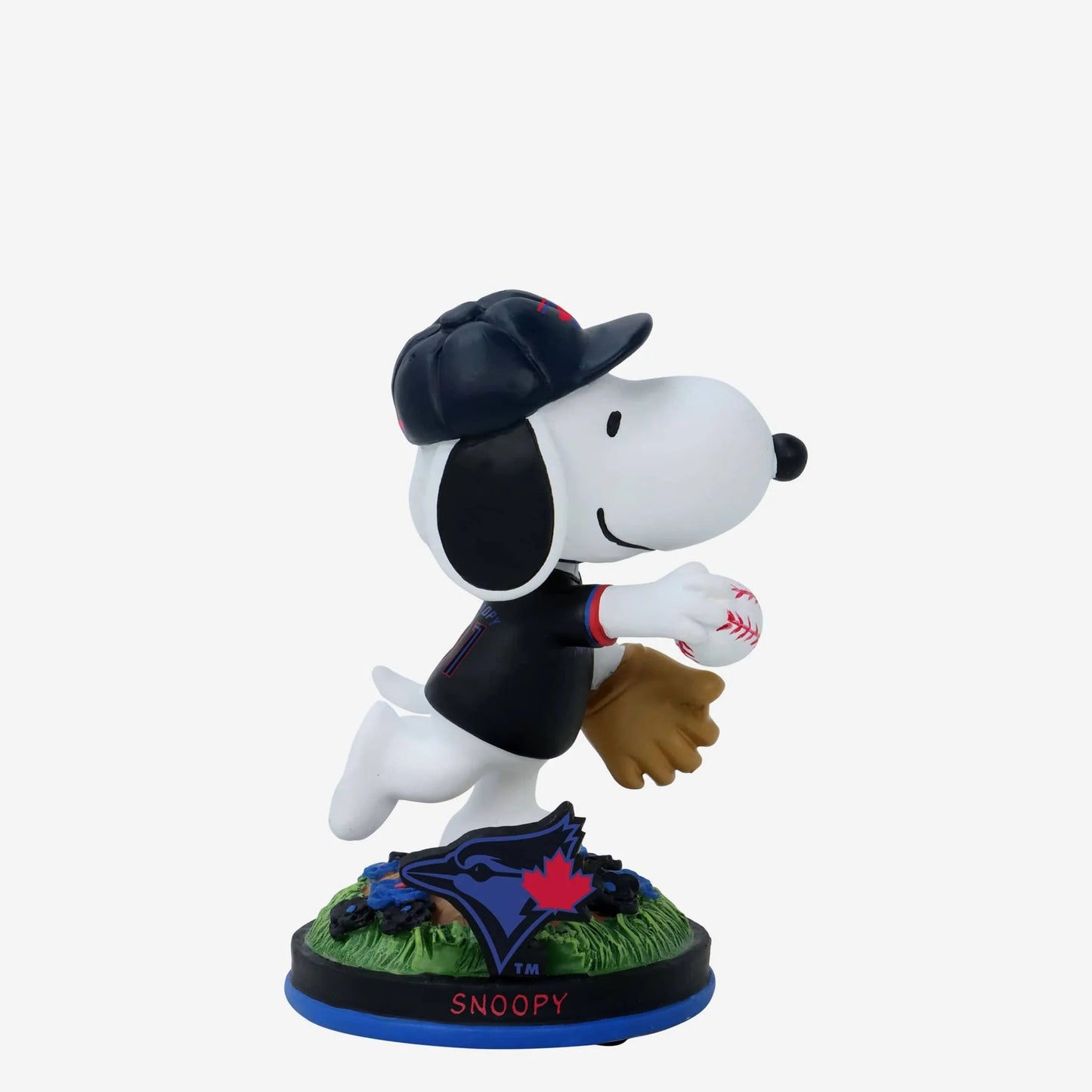 Snoopy figurine in a baseball uniform with a ball and glove on a white background