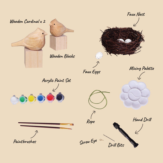 List of items for a craft project including wooden cardinals, blocks, nest, eggs, paint set, mixing palette, rope, hand drill, and paintbrushes on a beige background.