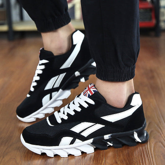 Black and white athletic shoes with a Union Jack design on a wooden floor.