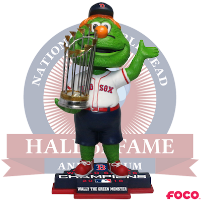 Green monster mascot figurine holding a trophy with 'HALL OF FAME' text and FOCO logo.