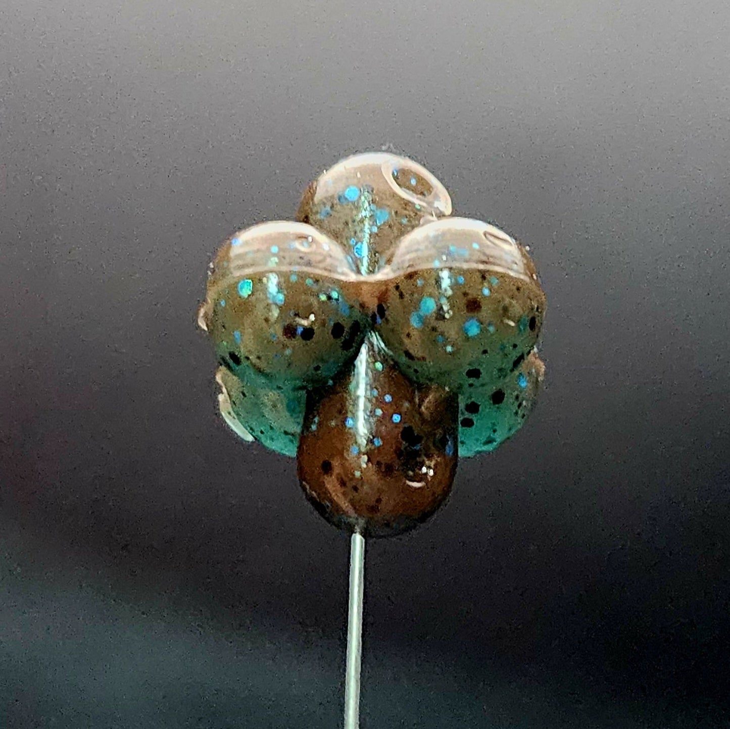 Salmon Egg Cluster Fishing Lure on a dark background