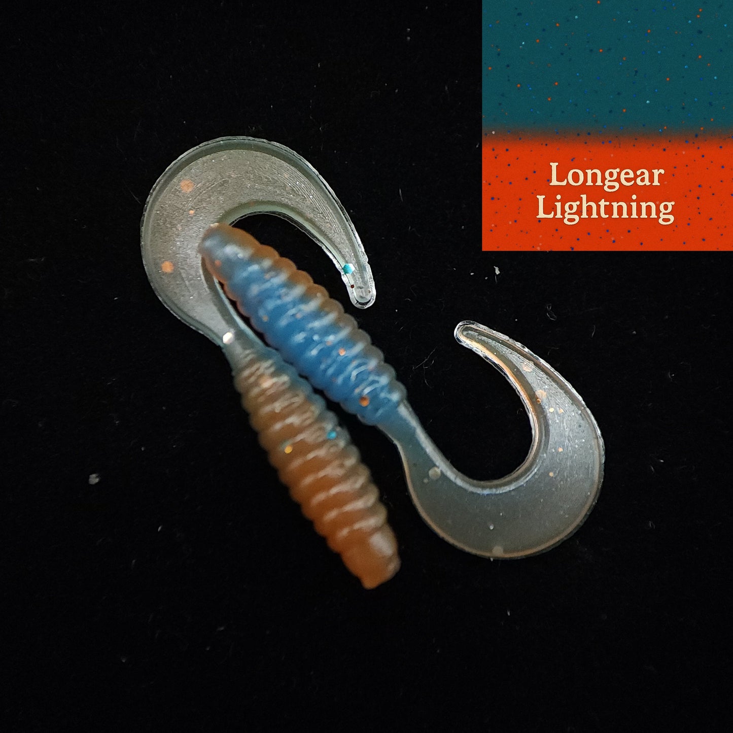 Fishing lure with a blue and brown body and clear hook on a black background, labeled 'Longear Lightning'.