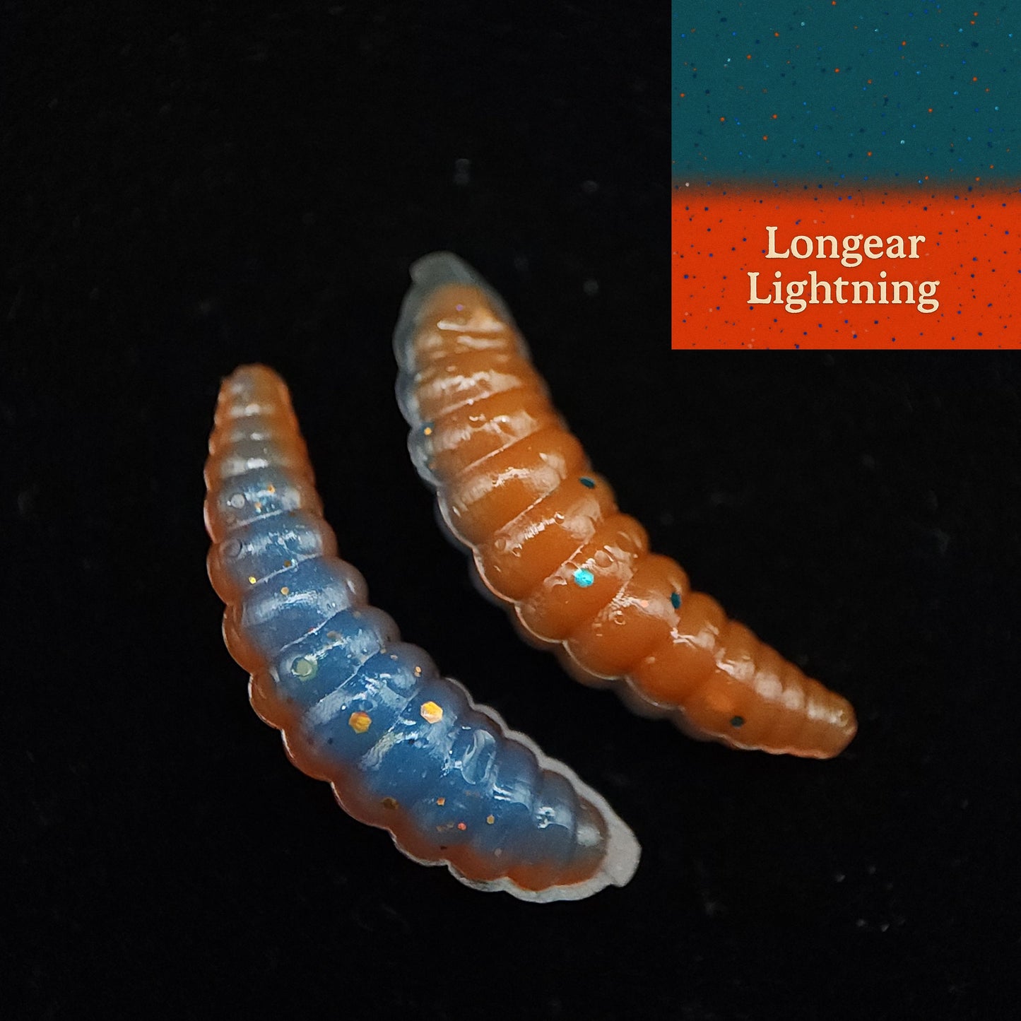 Two colorful fishing lures labeled 'Longear Lightning' on a black background.