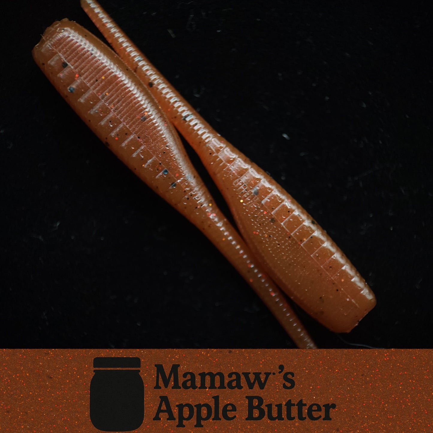 Two brown fish lures on a dark background with 'Mamaw's Apple Butter' branding.