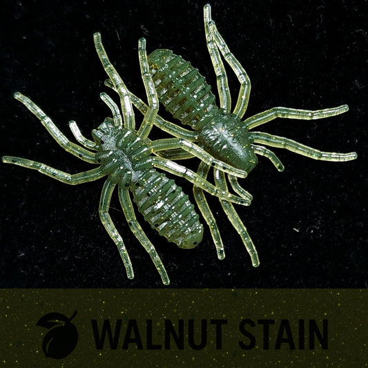 Green spider-like fishing lure on a black background with 'Walnut Stain' text.