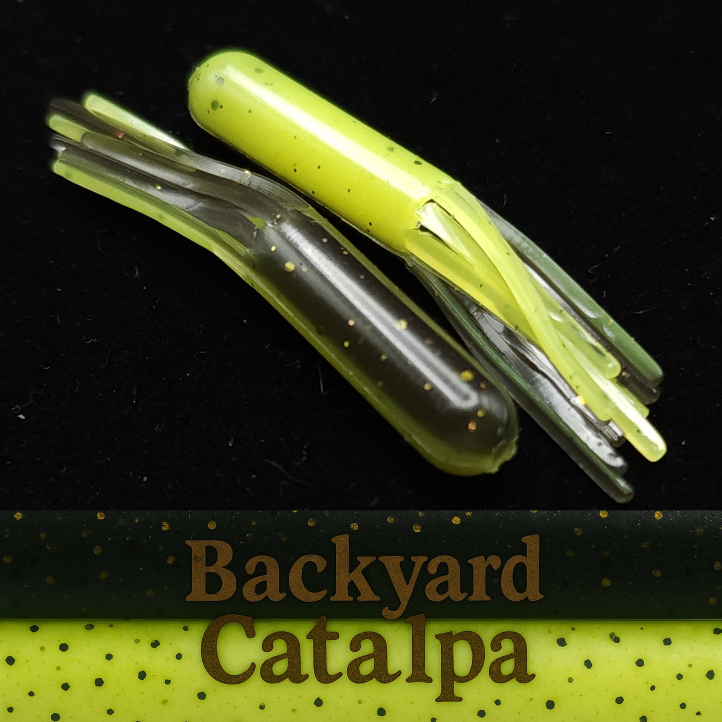 Two fishing lures with 'Backyard Catalpa' branding on a black background