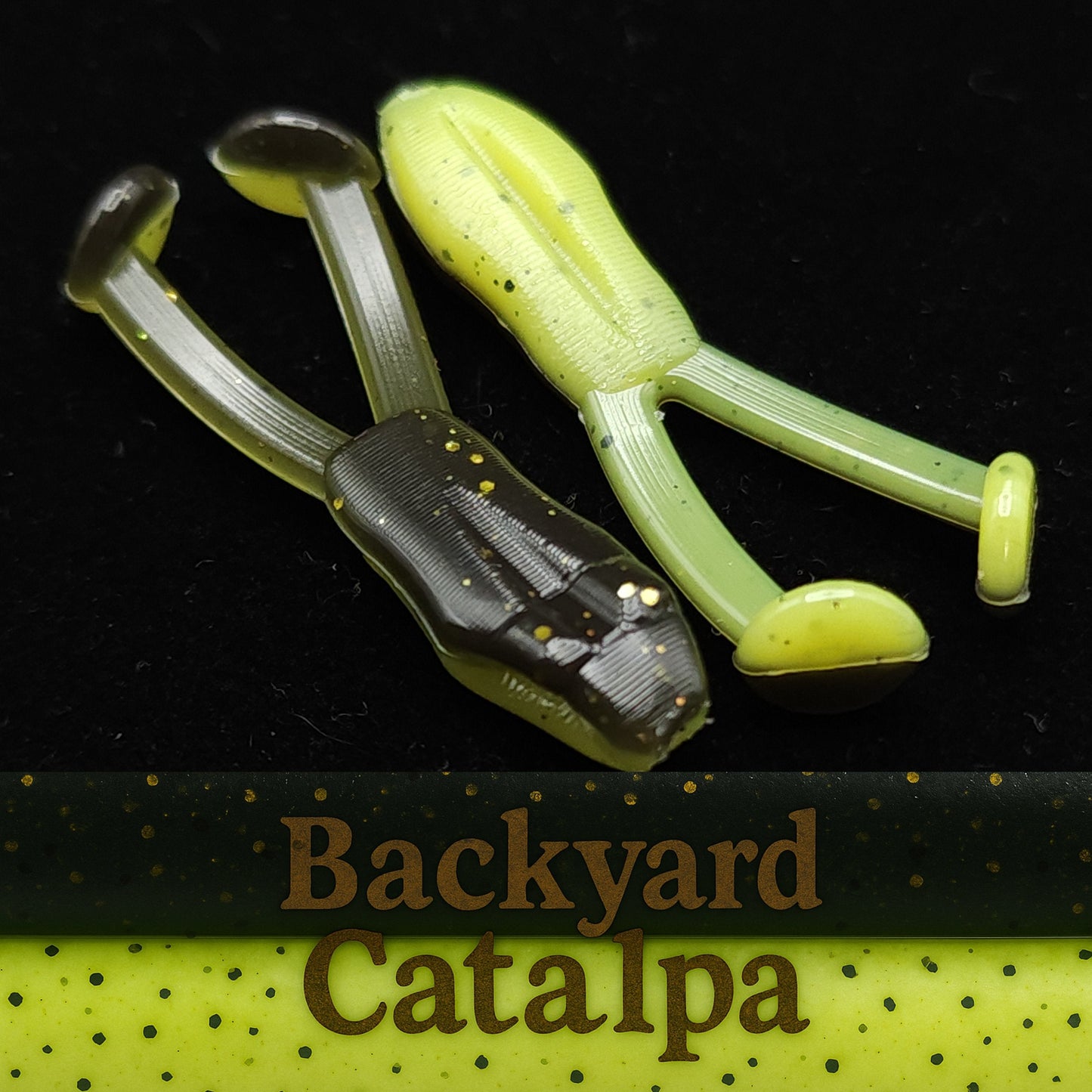 Two green and black fishing lures on a black background with 'Backyard Catalpa' branding.